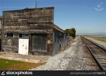Tumbledown building along the railroad tracks, Alviso, California