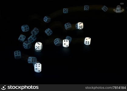 Tumbling dice, captured with a stroboscopic flash