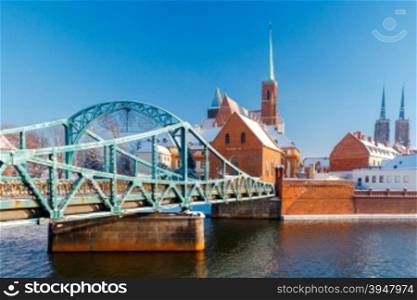 Tumski bridge over the river Odra to the island in winter.. Wroclaw. Tumski bridge.