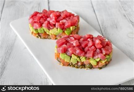 Tuna and salmon tartare on the serving plate