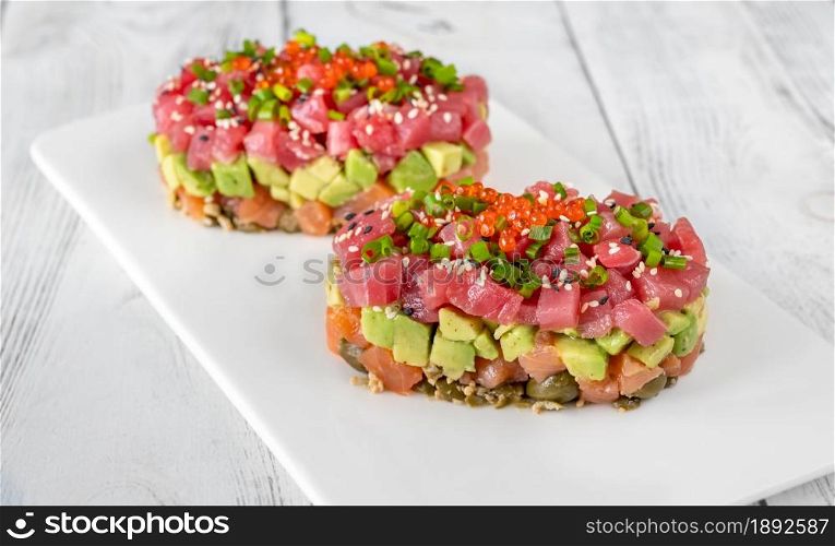 Tuna and salmon tartare on the serving plate