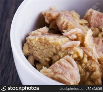 Tuna in a white cup, horizontal image