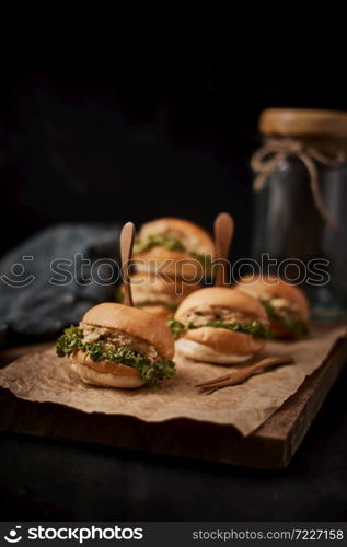 Tuna mini burger on table .Food Concept.. Tuna mini burger on table .