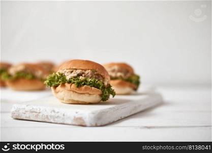 Tuna mini burger on table .Food Concept. . Tuna mini burger on table .