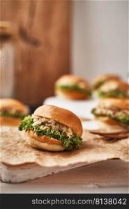 Tuna mini burger on table .Food Concept. . Tuna mini burger on table .