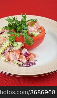Tuna salad with different vegetables on plate