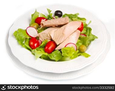 Tuna salad with tomatoes, olives and raddish