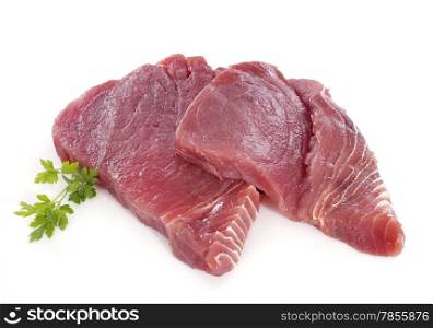 tuna steak in front of white background