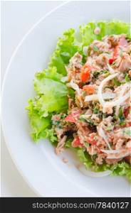 Tuna with tea leaves and mix vegetables , spicy salad