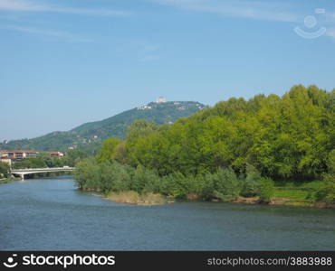 Turin hills. View of the hills surrounding the city of Turin, Italy with the Basilica di Superga baroque church on top of the hill