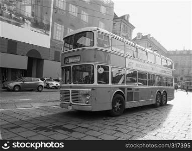 TURIN, ITALY - CIRCA DECEMBER 2018: Red double decker bus Viberti CV61 at Trolley Festival in black and white. Red double decker bus Viberti CV61 at Turin Trolley Festival in black and white