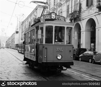 TURIN, ITALY - CIRCA DECEMBER 2018: Vintage 116 tram (built in 1911) at Trolley Festival in black and white. Vintage 116 tram at Turin Trolley Festival in black and white