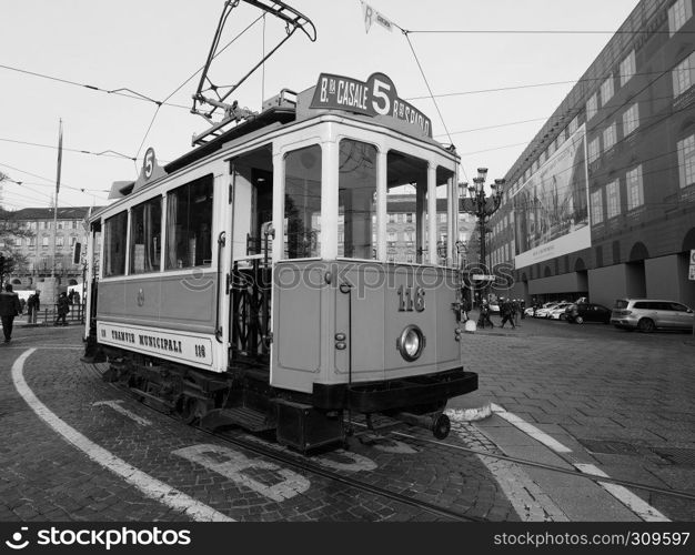 TURIN, ITALY - CIRCA DECEMBER 2018: Vintage 116 tram (built in 1911) at Trolley Festival in black and white. Vintage 116 tram at Turin Trolley Festival in black and white