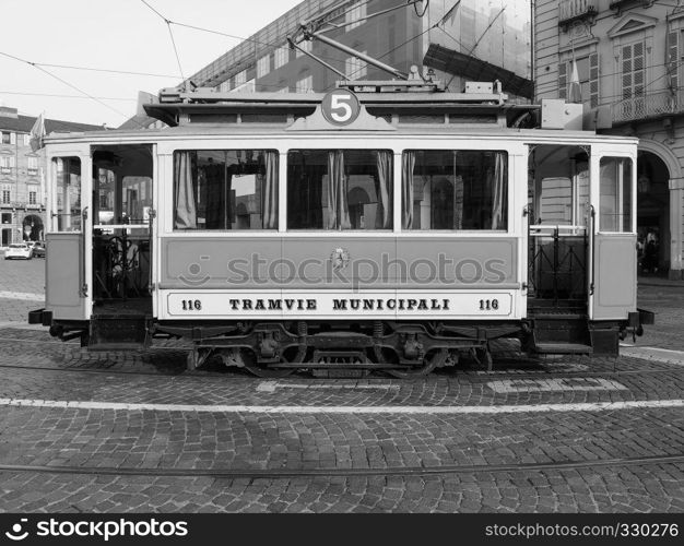 TURIN, ITALY - CIRCA DECEMBER 2018: Vintage 116 tram (built in 1911) at Trolley Festival in black and white. Vintage 116 tram at Turin Trolley Festival in black and white