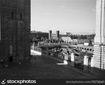 TURIN, ITALY - CIRCA OCTOBER 2018: Porta Palatina (Palatine Gate) ruins in black and white. Porta Palatina (Palatine Gate) in Turin in black and white