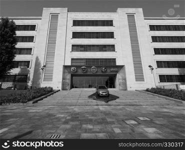 TURIN, ITALY - CIRCA SEPTEMBER 2018: Fiat Chrysler Automobiles (FCA) Mirafiori car factory for Fiat, Lancia, Alfa Romeo, Jeep and Abarth brands in black and white. Fiat Mirafiori Chrysler Automobiles (FCA) car factory in Turin in black and white