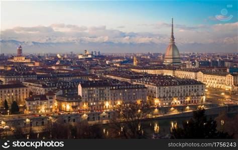 Turin, Piedmont Region, Italy. Panorama from Monte dei Cappuccini (Cappuccini&rsquo;s Hill) at sunset with Alps mountains and Mole Antonelliana monument.