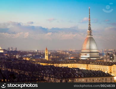 Turin, Piedmont Region, Italy. Panorama from Monte dei Cappuccini  Cappuccini’s Hill  at sunset with Alps mountains and Mole Antonelliana monument.