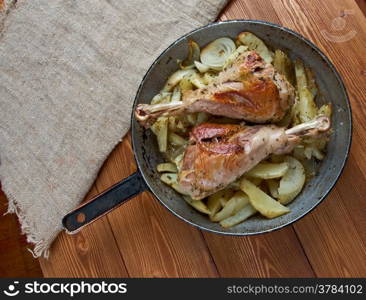 Turkey leg with baked potatoes .country cuisine