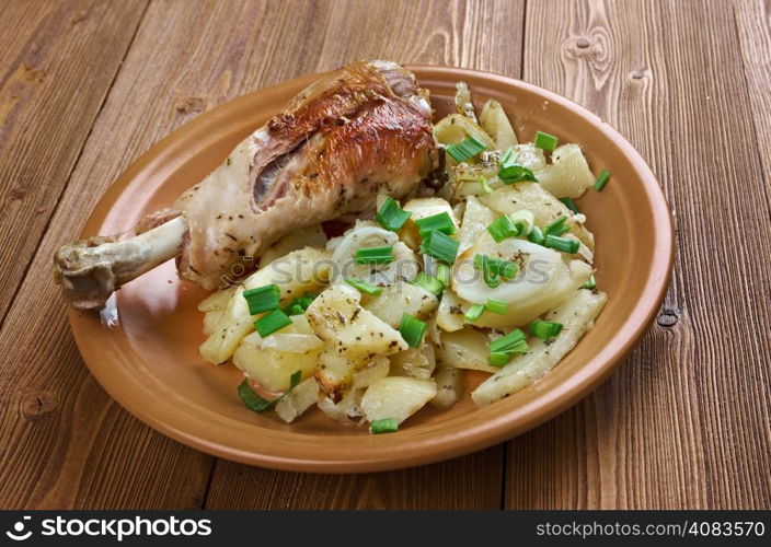 Turkey leg with baked potatoes .country cuisine