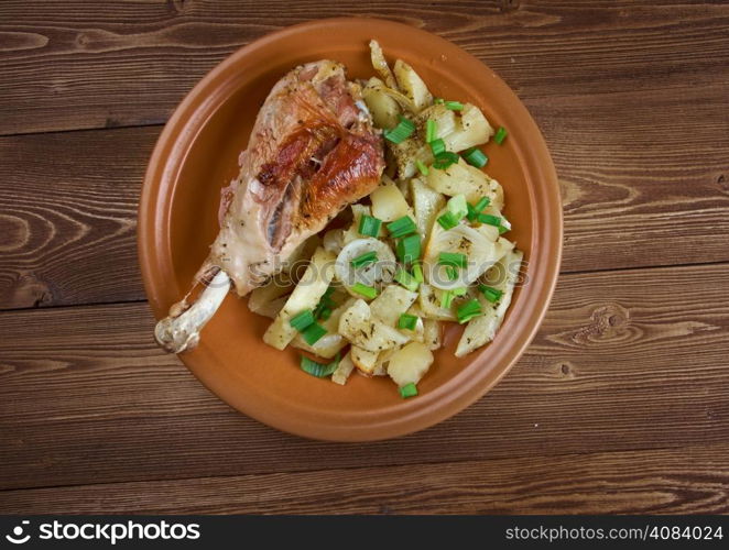 Turkey leg with baked potatoes .country cuisine