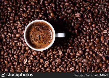 Turkish coffee on coffee beans background