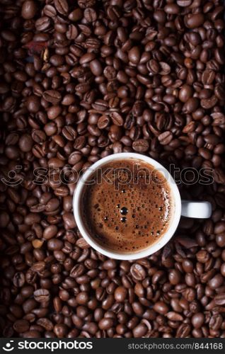 Turkish coffee on coffee beans background
