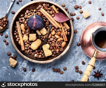 turkish coffee with figs. roasted coffee beans and spices for coffee