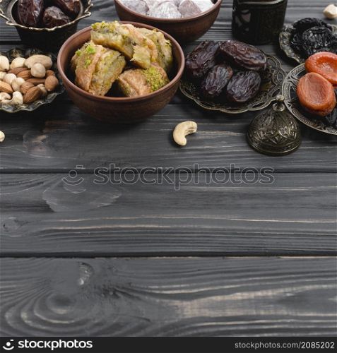 turkish delight baklava sweets dried fruits nuts wooden desk