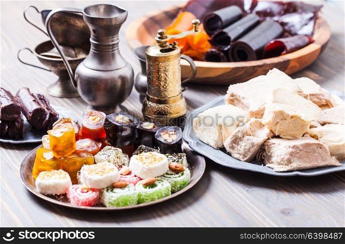 Turkish delight lokum with nuts on metal plate. Turkish delight rahat lokum