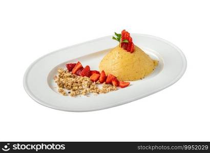 Turkish Dessert semolina halva.  Semolina dessert with cinnamon powder and strawberry