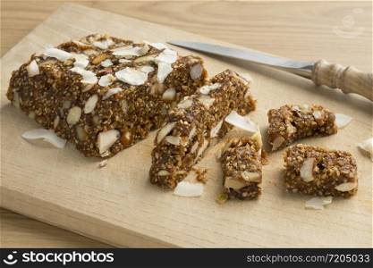 Turkish fig, fruit and nut cake pieces on a cutting board