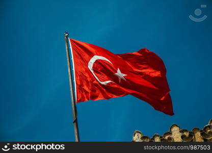 Turkish national flag hang on a pole in open air