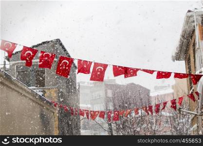 Turkish national flag hanging in the street in open air