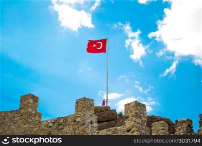 Turkish national flag . Turkish national flag on a pole on a fortress