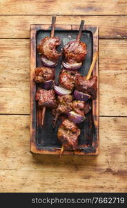 Turkish or arabic tradition liver kebab on skewers.Ciger kebab. Grilled beef liver kebabs