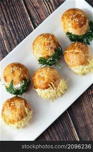 Turkish pastry filled with dill, parsley, cream cheese and cheddar cheese. Turkish name: Sakall? Pogaca or Sacakl? Pogaca