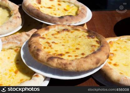 Turkish style flat bread covered with cheese