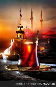 Turkish tea in the background of the maiden tower in Istanbul. Tea and Maiden Tower