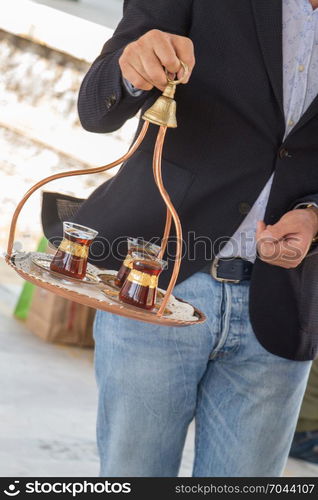 Turkish tea is served in traditional glass