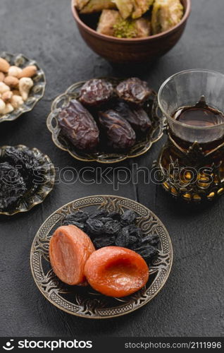 turkish tea with dates dried apricot raisin arabian iron plate ramadan