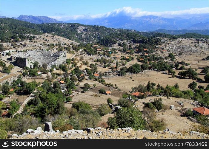 Turkish village and ruins of ancient theater in Selge, Turkey