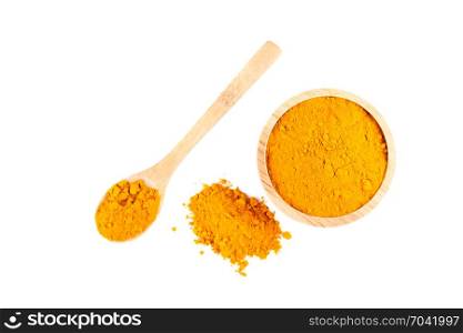 turmeric powder in wooden bowl and wooden spoon isolated on white background