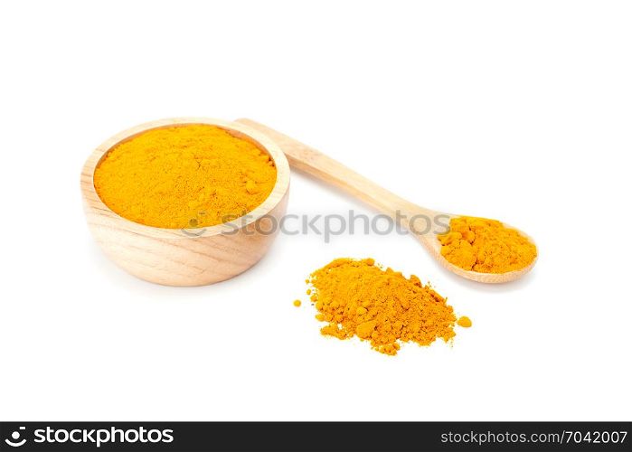 turmeric powder in wooden bowl and wooden spoon isolated on white background