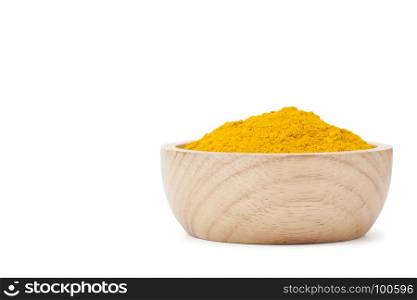 turmeric powder in wooden bowl isolated on white background with clipping path