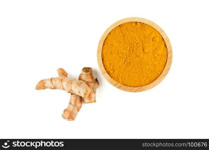 Turmeric rhizome and turmeric powder in wooden bowl isolated on white background with clipping path