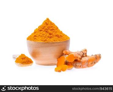 Turmeric roots with turmeric powder on white background