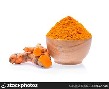 Turmeric roots with turmeric powder on white background