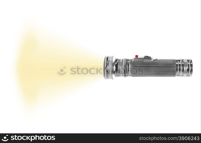 turned on metal flashlight isolated on white