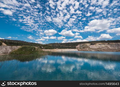 Turqoise lake in an open pit mine in guadalajara, Spain